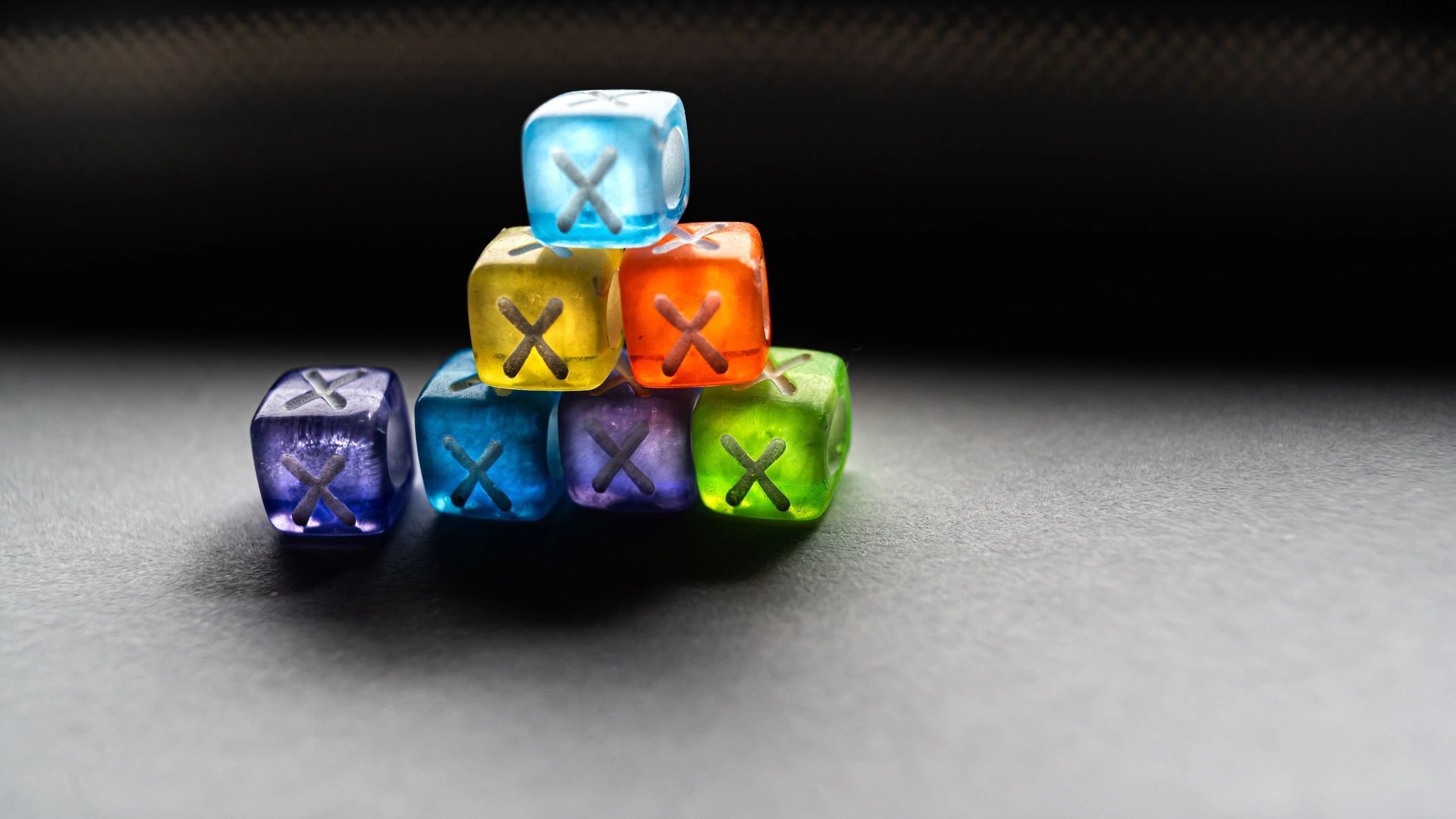 Colorful fantasy dice arranged for a tabletop session